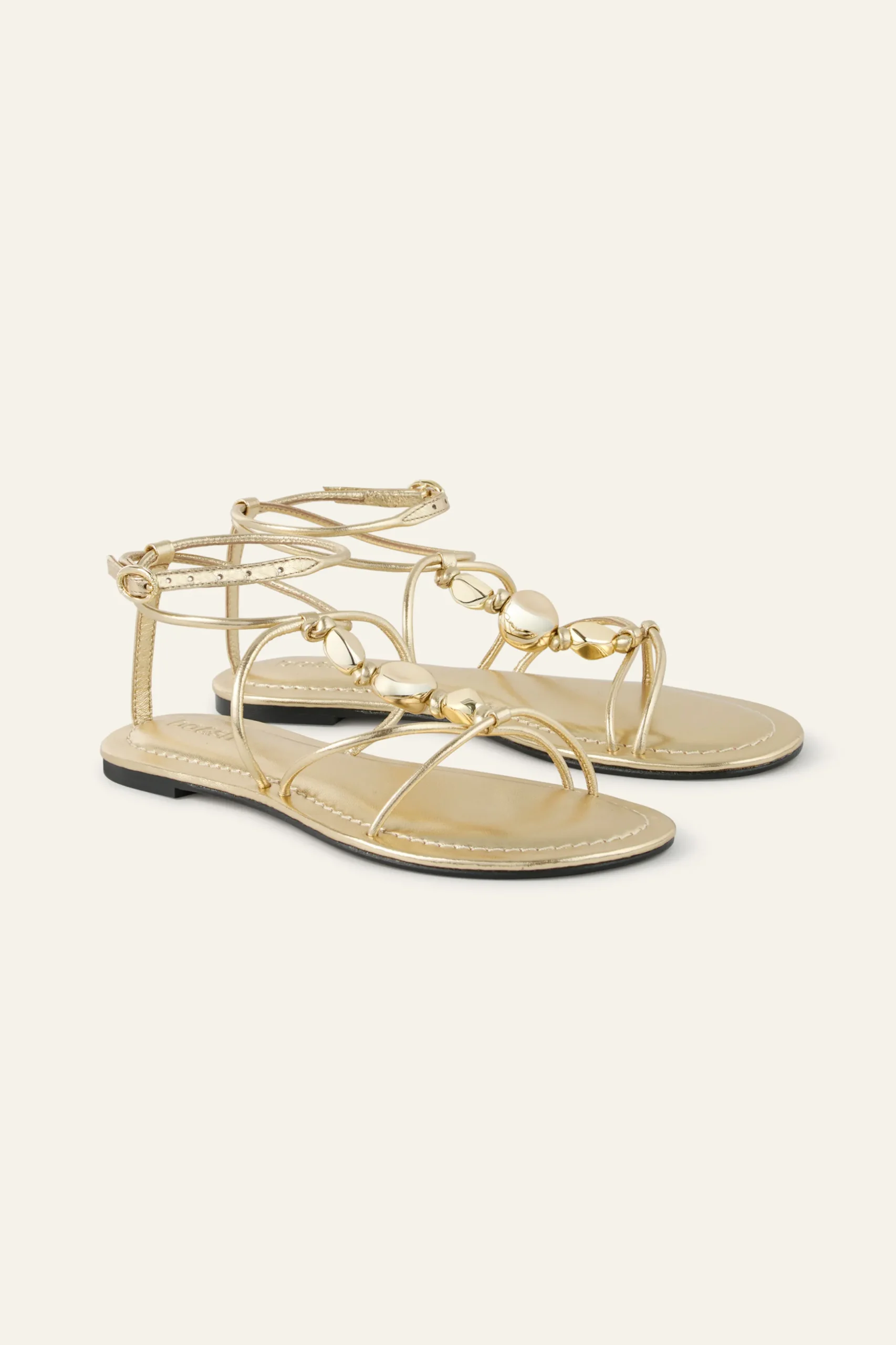 CAYA flat leather sandals