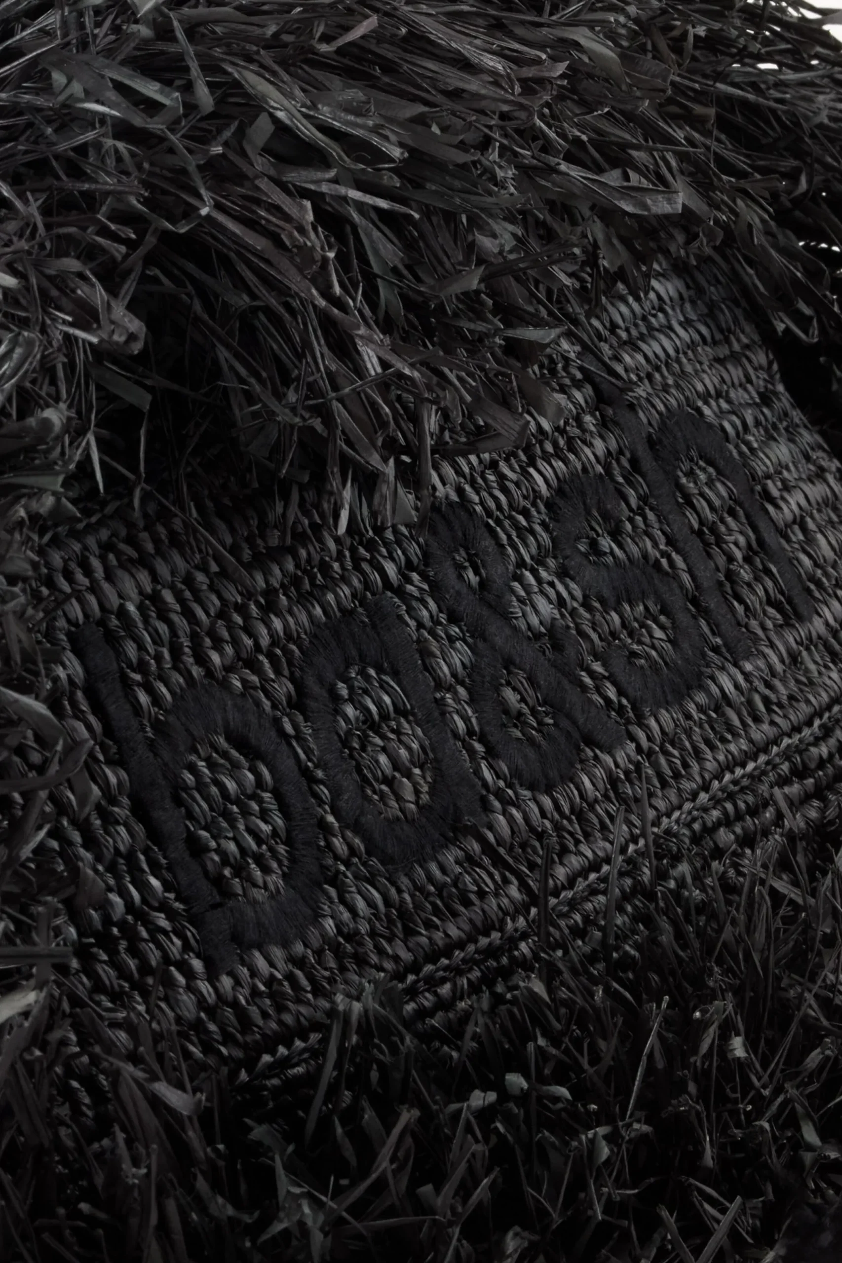 JUNE fringed raffia clutch