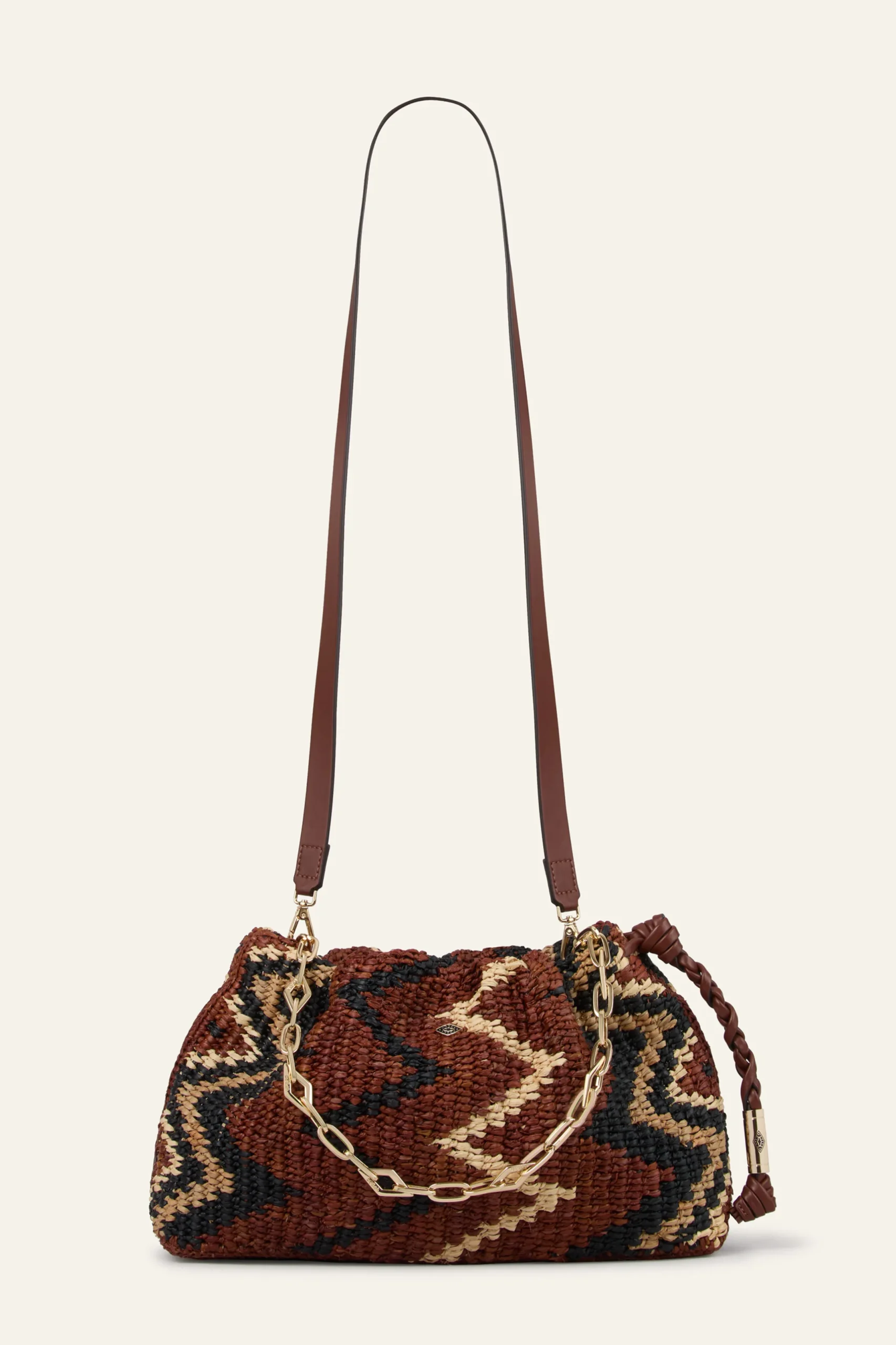 JUNE tribal-inspired raffia clutch