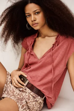 VERY top with ruffled sleeves