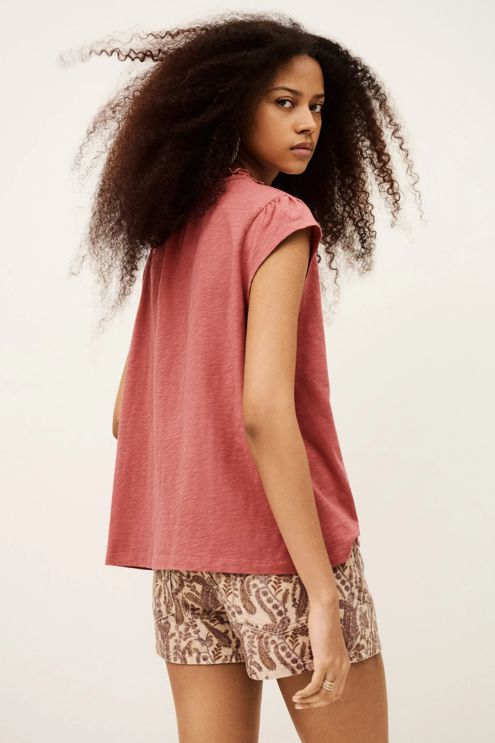 VERY top with ruffled sleeves