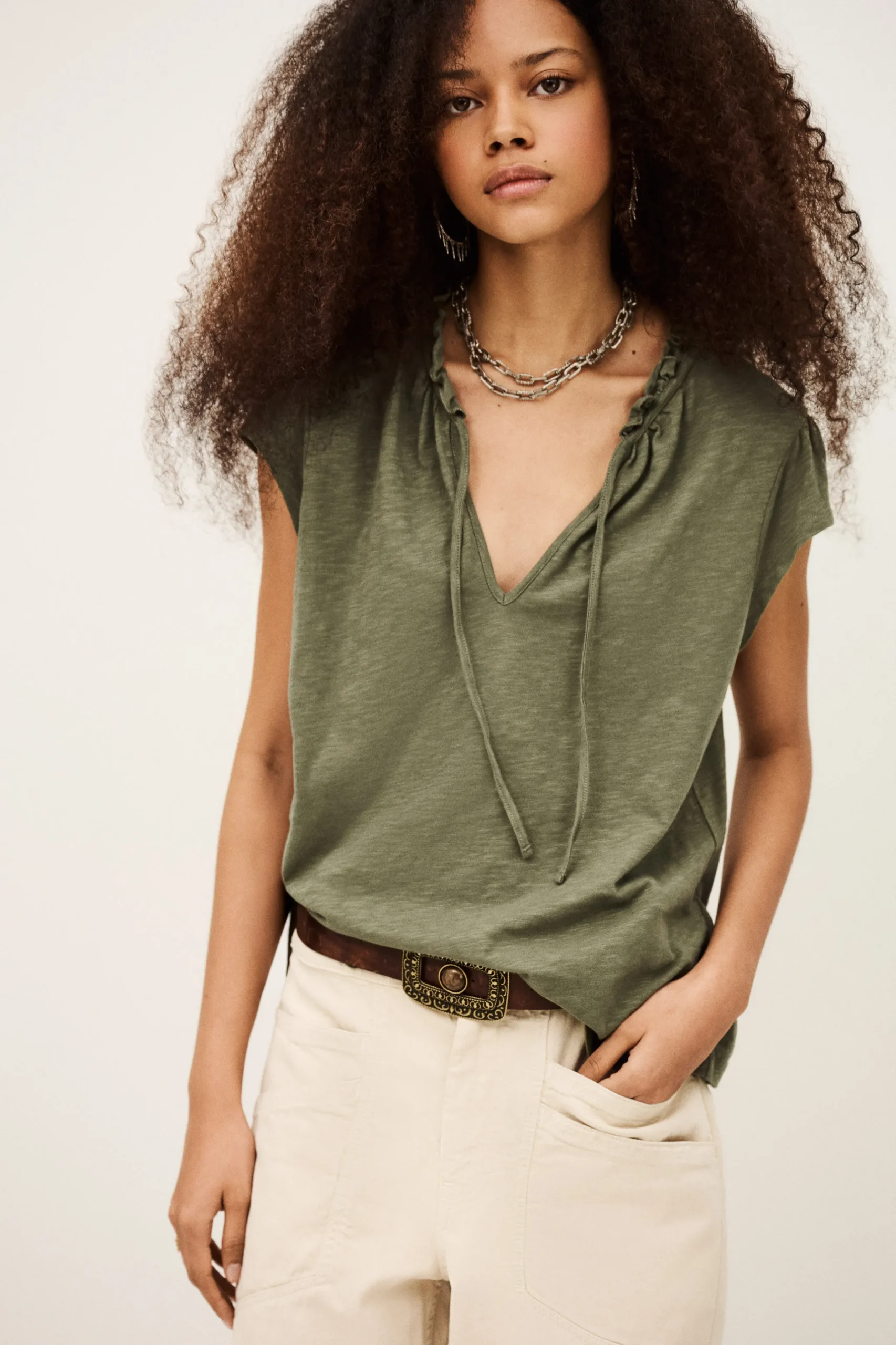 VERY top with ruffled sleeves